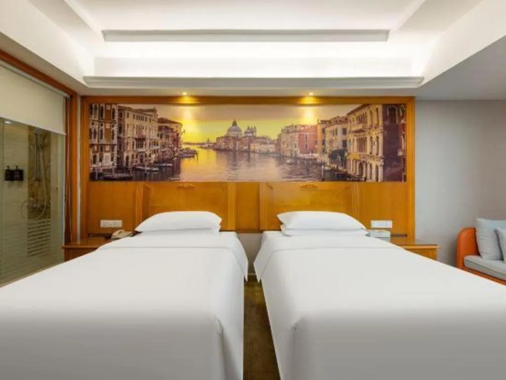 Bed in Vienna Hotel Guangzhou Luochongwei Bus Station Branch