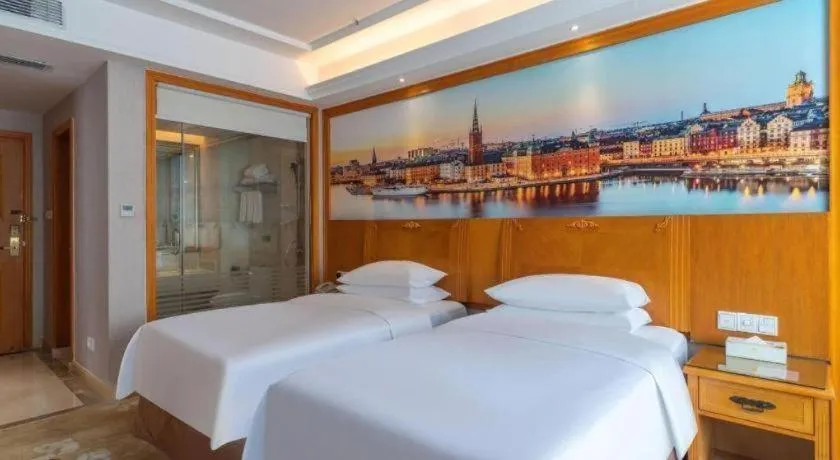 Bed in Vienna Hotel Guangzhou Luochongwei Bus Station Branch