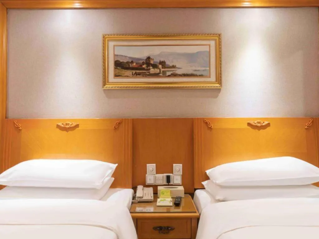 Bed in Vienna Hotel Guangzhou Luochongwei Bus Station Branch