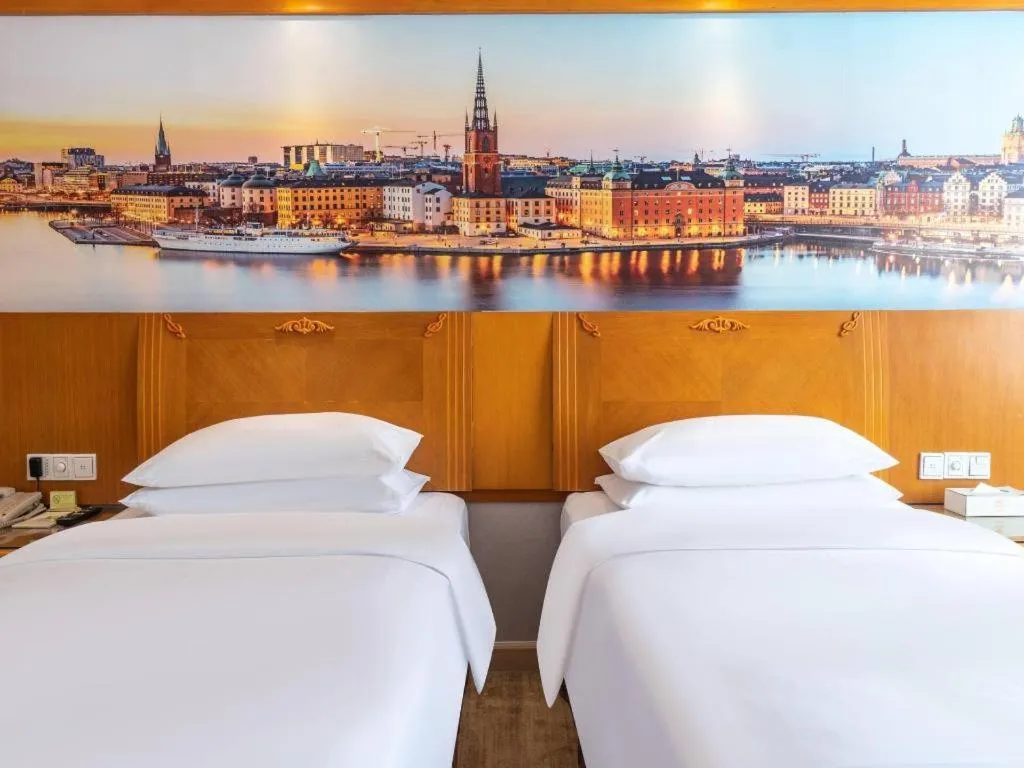 Bed in Vienna Hotel Guangzhou Luochongwei Bus Station Branch