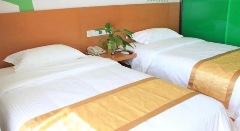 Bed in Vatica Tianjin Jinghai Bus Station Home World Plaza Hotel