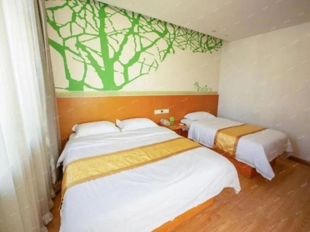 Bed in Vatica Tianjin Jinghai Bus Station Home World Plaza Hotel