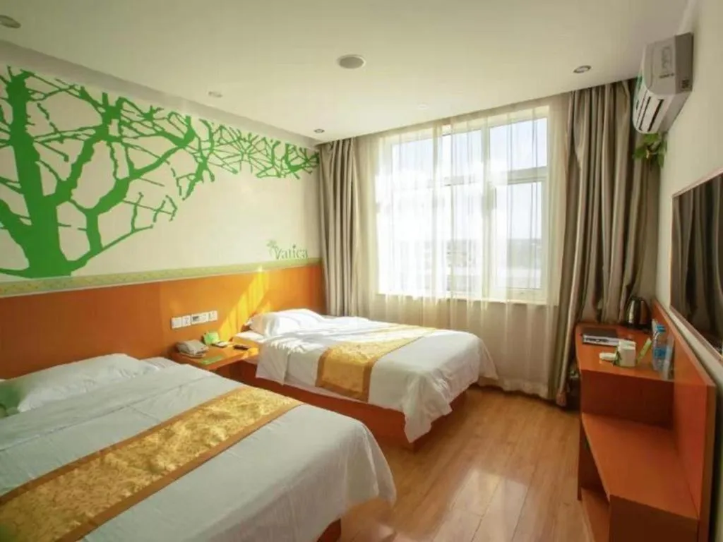 Bed in Vatica Tianjin Jinghai Bus Station Home World Plaza Hotel