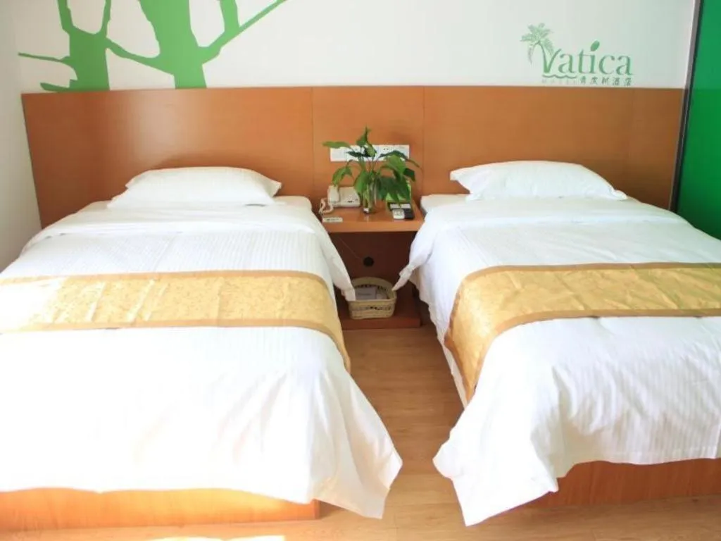 Bed in Vatica Tianjin Jinghai Bus Station Home World Plaza Hotel