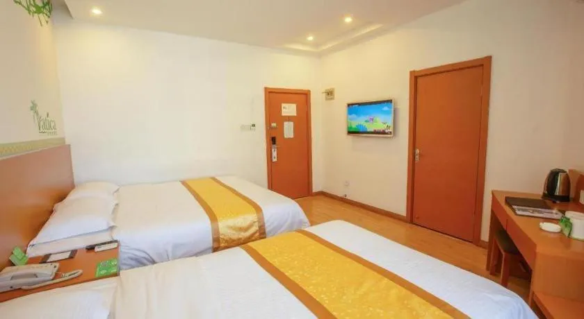 Bed in Vatica Tianjin Jinghai Bus Station Home World Plaza Hotel