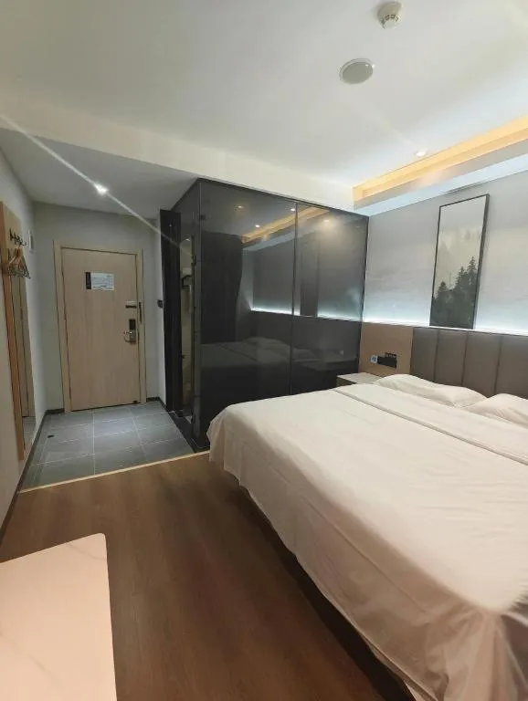 Bed in Vatica Tianjin Jinghai Bus Station Home World Plaza Hotel