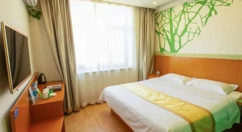 Bed in Vatica Tianjin Jinghai Bus Station Home World Plaza Hotel