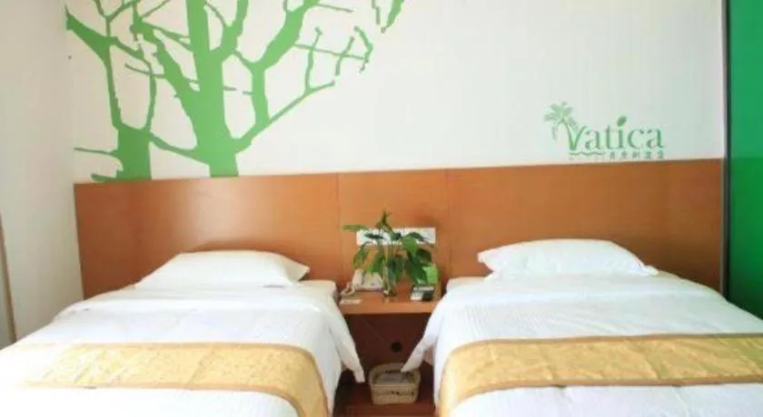 Bed in Vatica Tianjin Jinghai Bus Station Home World Plaza Hotel