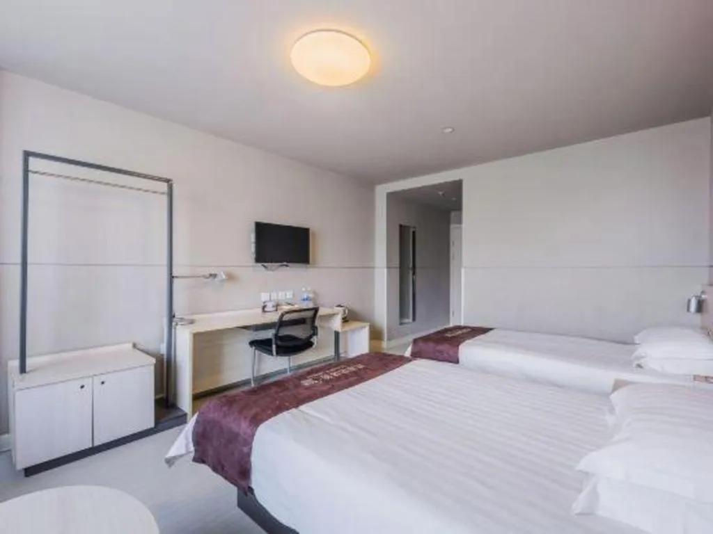 Bed in Jinjiang Inn Jiujiang Internation Exhibition Center