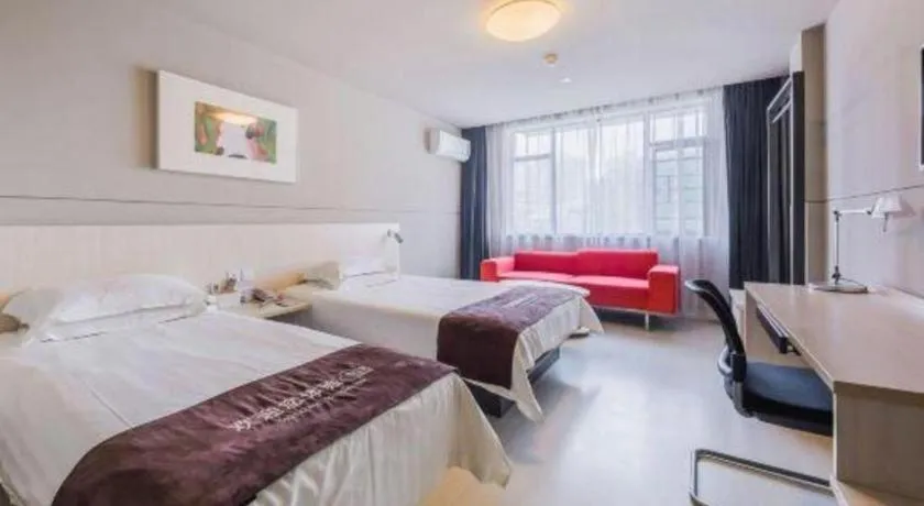 Bed in Jinjiang Inn Jiujiang Internation Exhibition Center