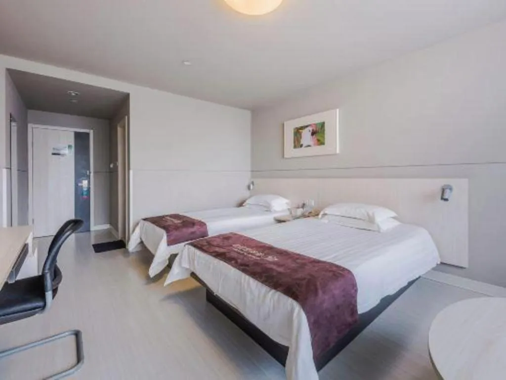 Bed in Jinjiang Inn Jiujiang Internation Exhibition Center