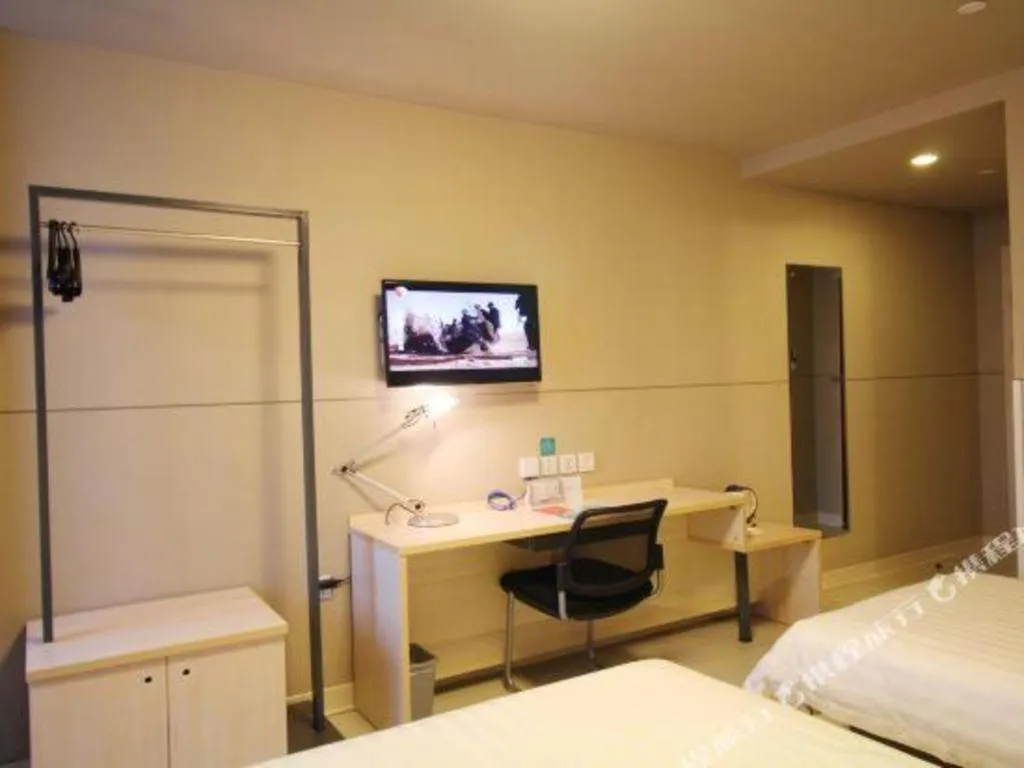 Bed in Jinjiang Inn Jiujiang Internation Exhibition Center