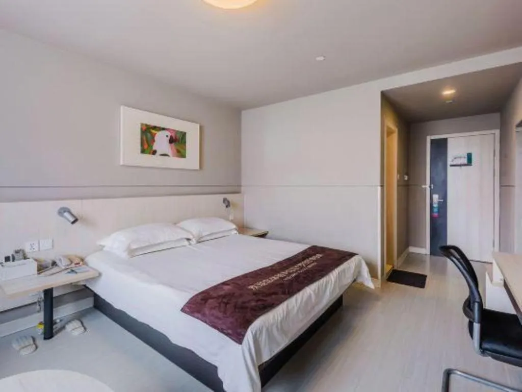 Bed in Jinjiang Inn Jiujiang Internation Exhibition Center