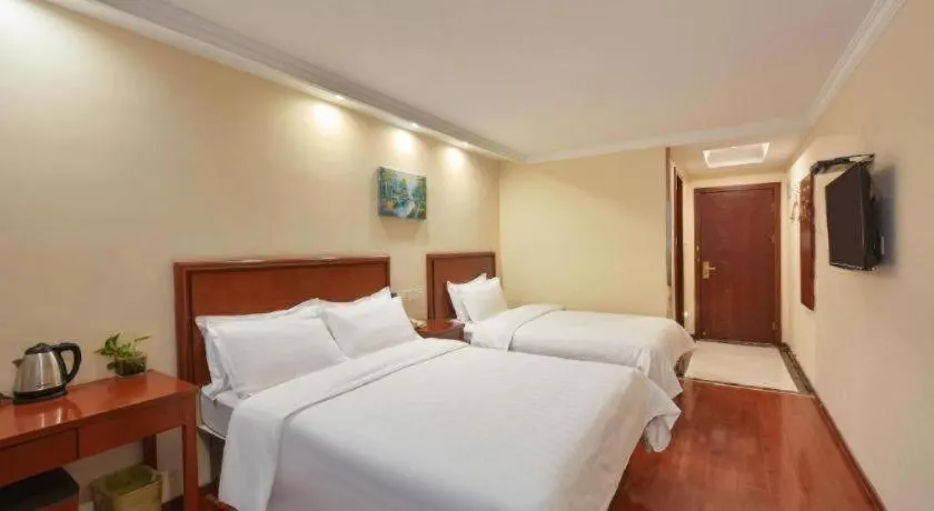 Bed in GreenTree Inn Nanjing Forestry University National Exhibition Center Express Hotel