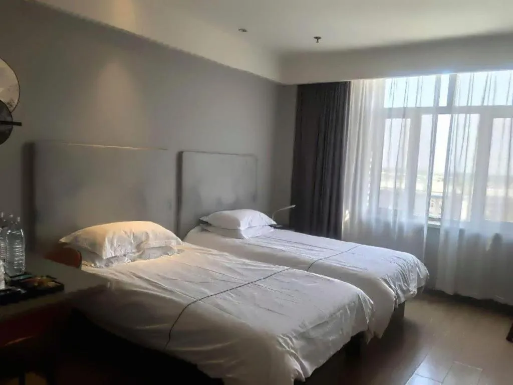 Bed in Jinjiang Inn Baotou Salaqi Railway Station