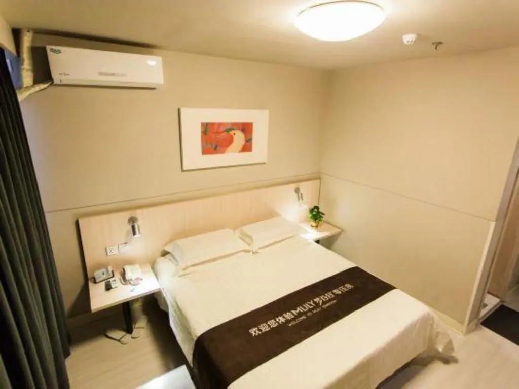 Bed in Jinjiang Inn Hohhot Dazhao Hospital Metro Station