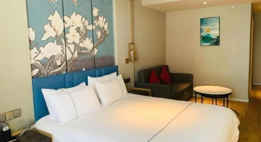 Bed in Magnotel Business Xuzhou Feng County Bus Station