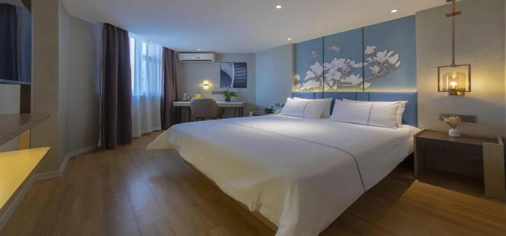 Bed in Magnotel Business Xuzhou Feng County Bus Station