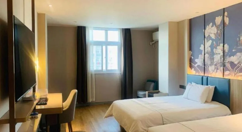 Bed in Magnotel Business Xuzhou Feng County Bus Station