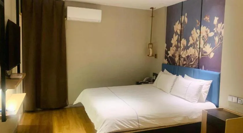 Bed in Magnotel Business Xuzhou Feng County Bus Station