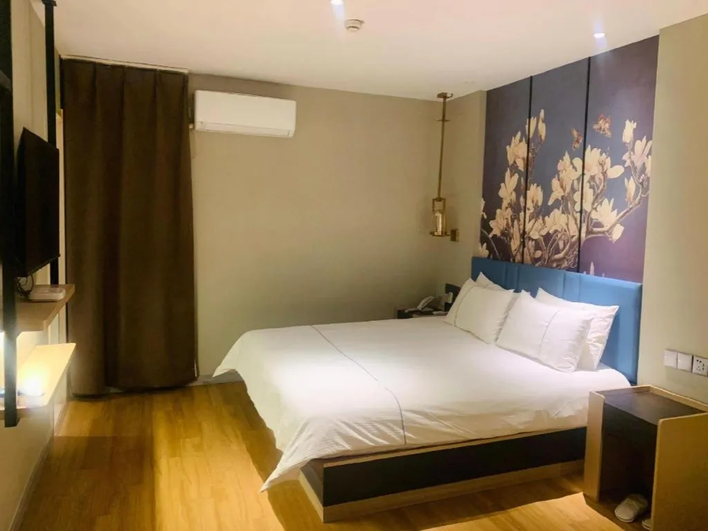 Bed in Magnotel Business Xuzhou Feng County Bus Station