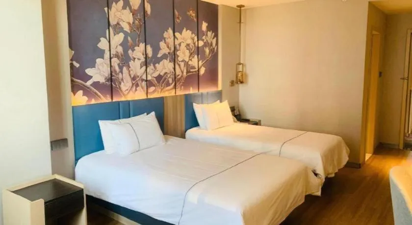 Bed in Magnotel Business Xuzhou Feng County Bus Station