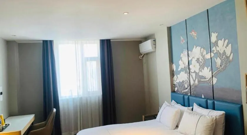 Bed in Magnotel Business Xuzhou Feng County Bus Station