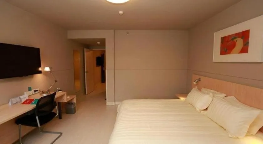 Bed in Jinjiang Inn Hotel Tianjin Xinkai Road Branch