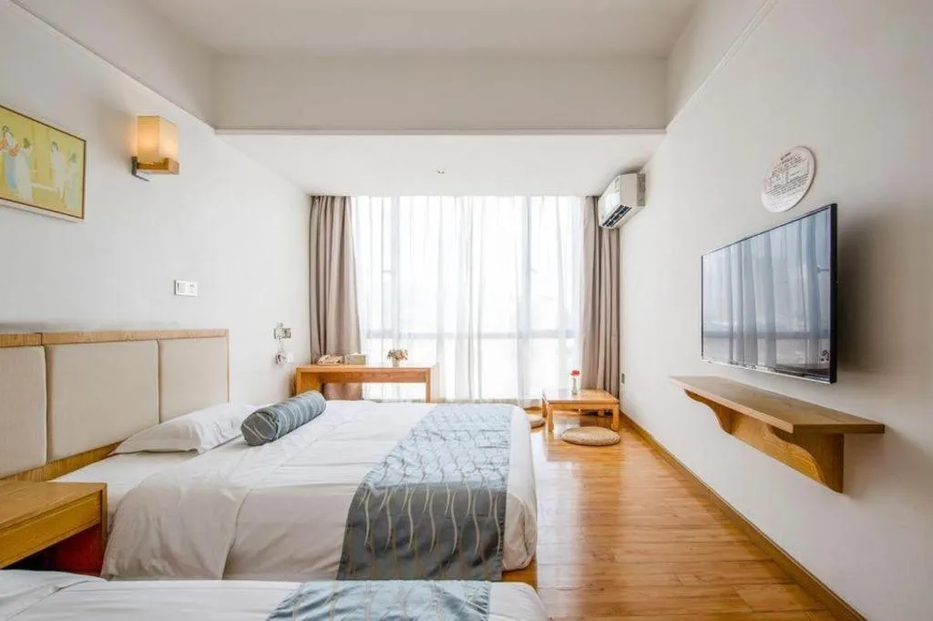 Bed in Guangzhou Impression Hotel