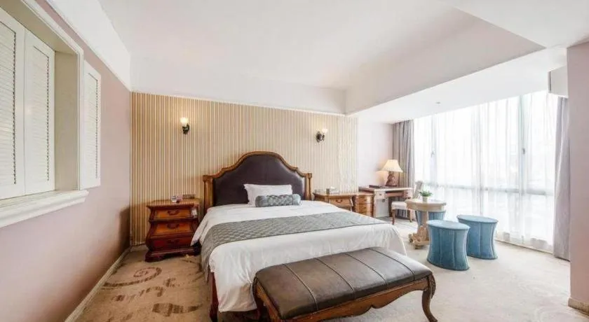 Bed in Guangzhou Impression Hotel