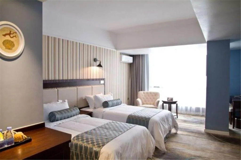 Bed in Guangzhou Impression Hotel