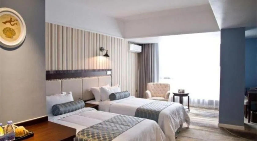 Bed in Guangzhou Impression Hotel