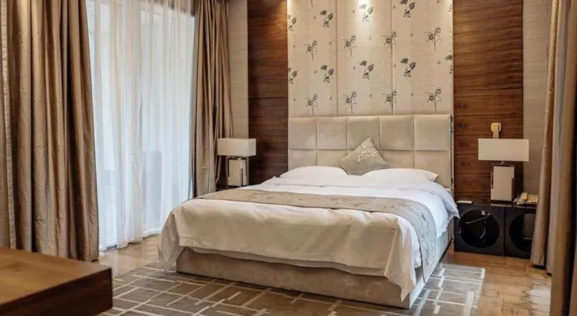 Bed in CITIC Jinling Hotel