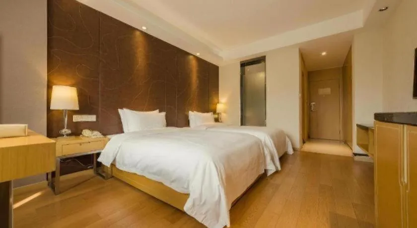Bed in CITIC Jinling Hotel
