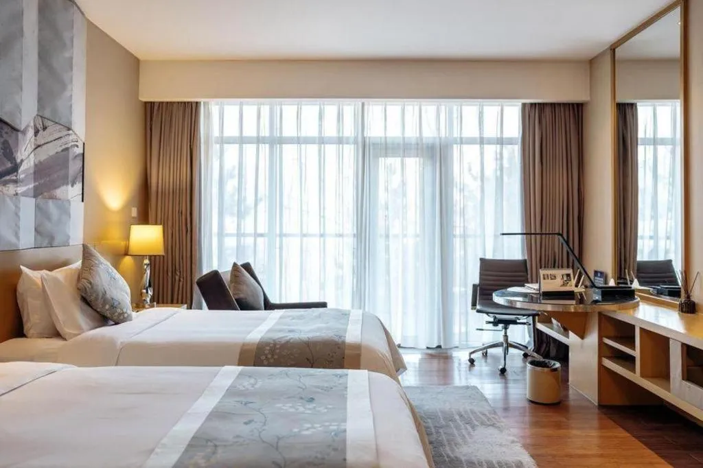 Bed in CITIC Jinling Hotel