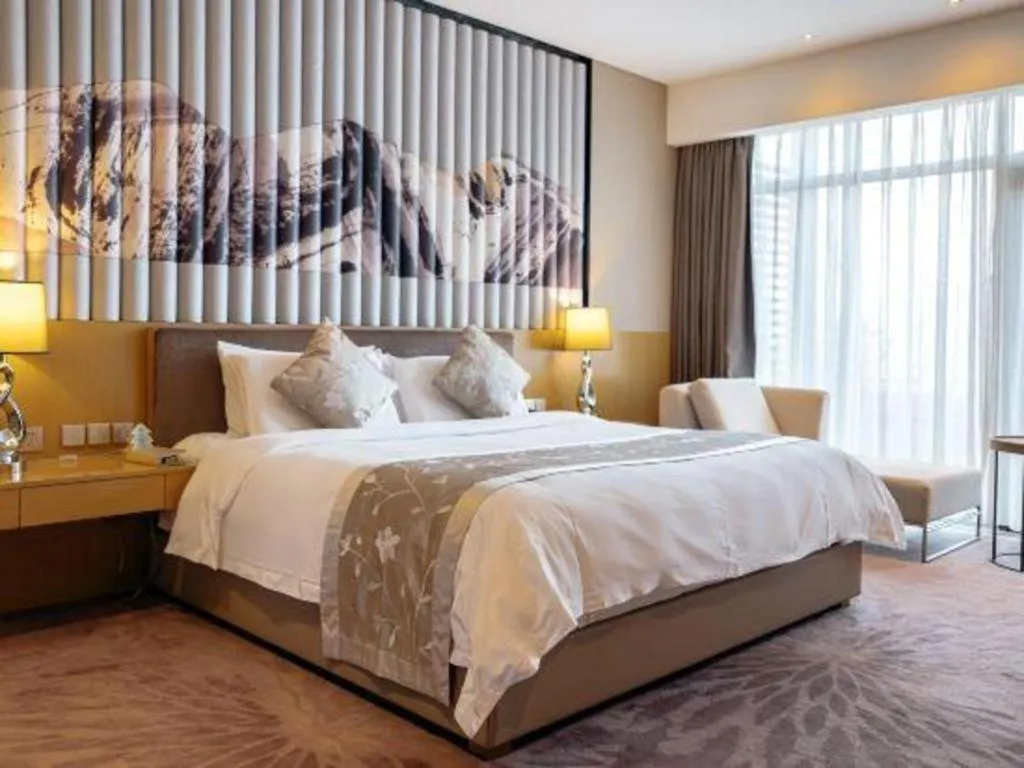 Bed in CITIC Jinling Hotel