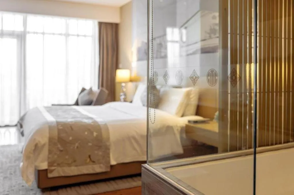 Bed in CITIC Jinling Hotel