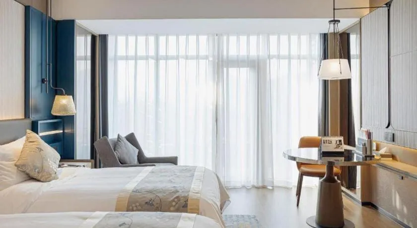 Bed in CITIC Jinling Hotel