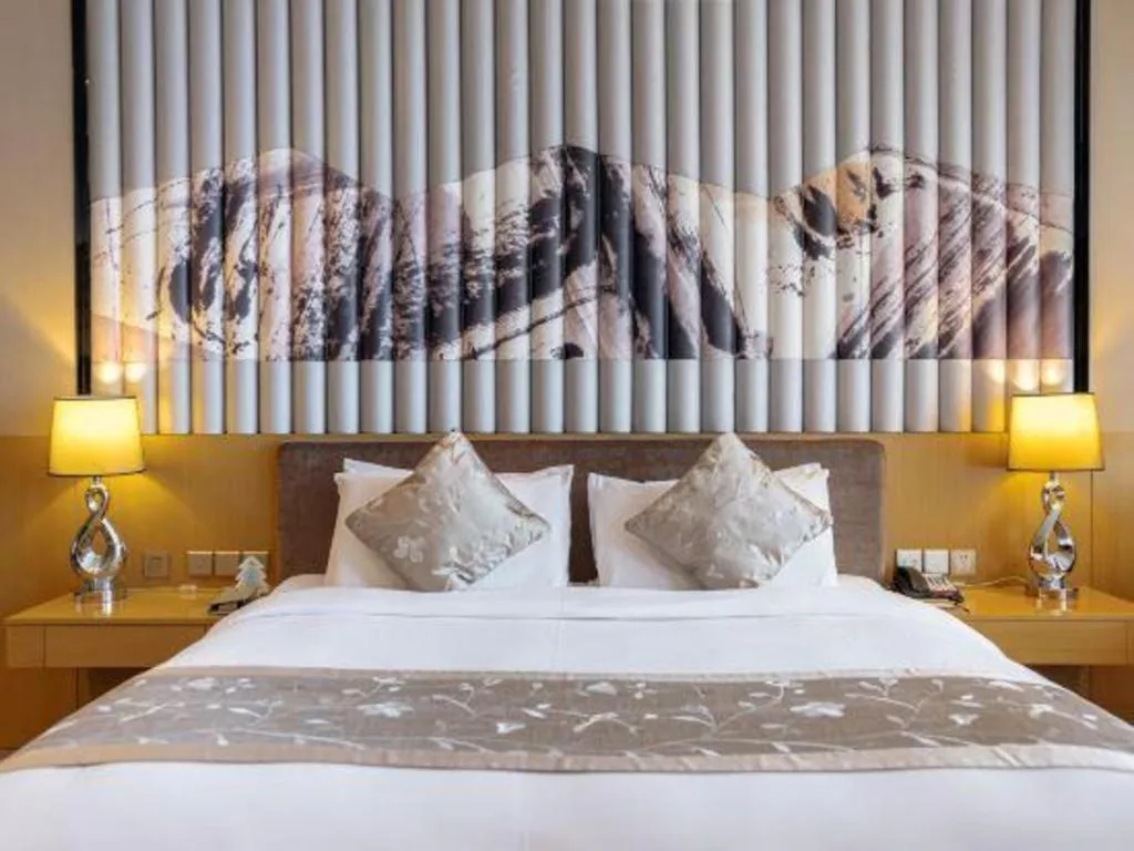 Bed in CITIC Jinling Hotel