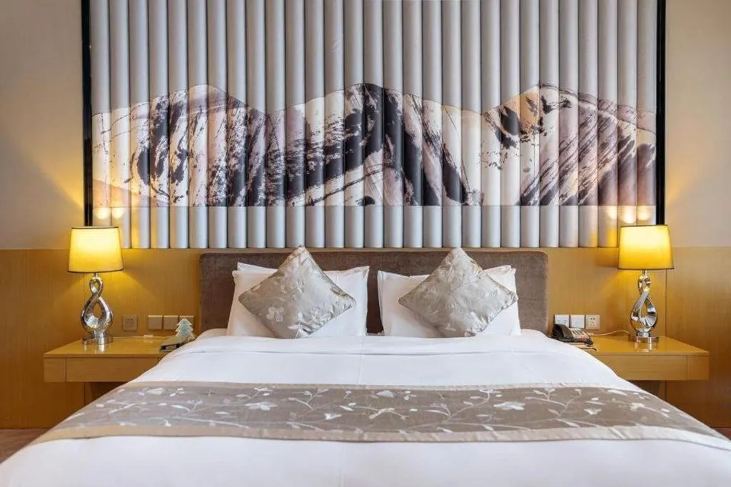 Bed in CITIC Jinling Hotel