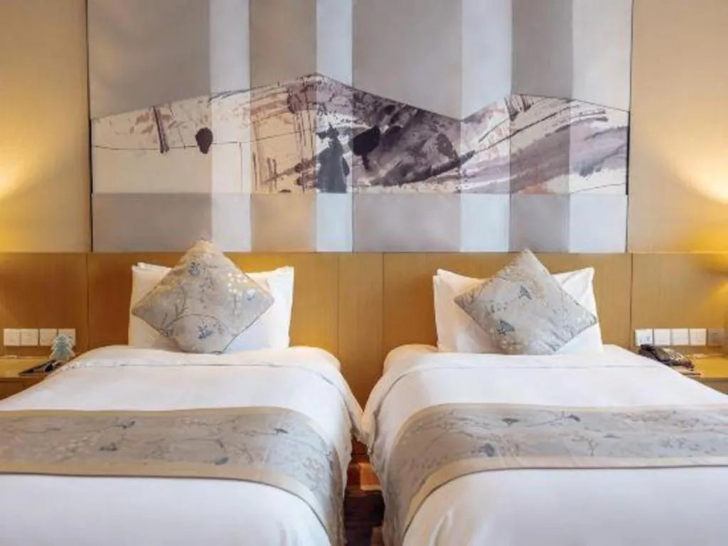 Bed in CITIC Jinling Hotel