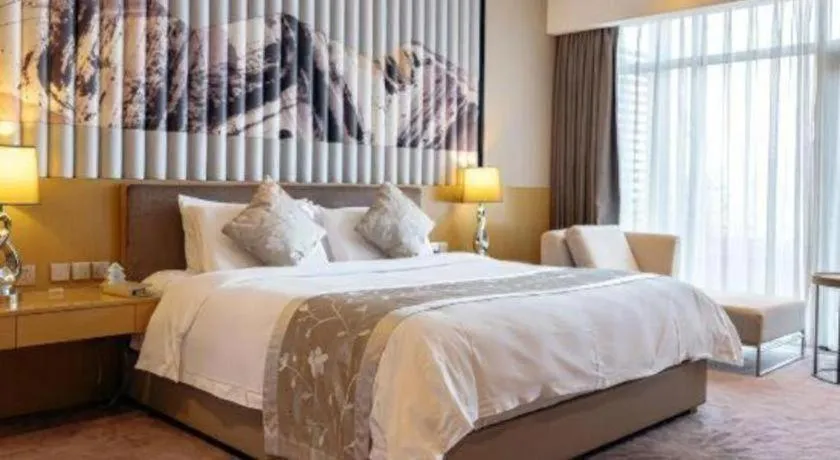 Bed in CITIC Jinling Hotel