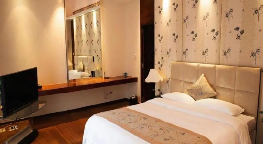 Bed in CITIC Jinling Hotel