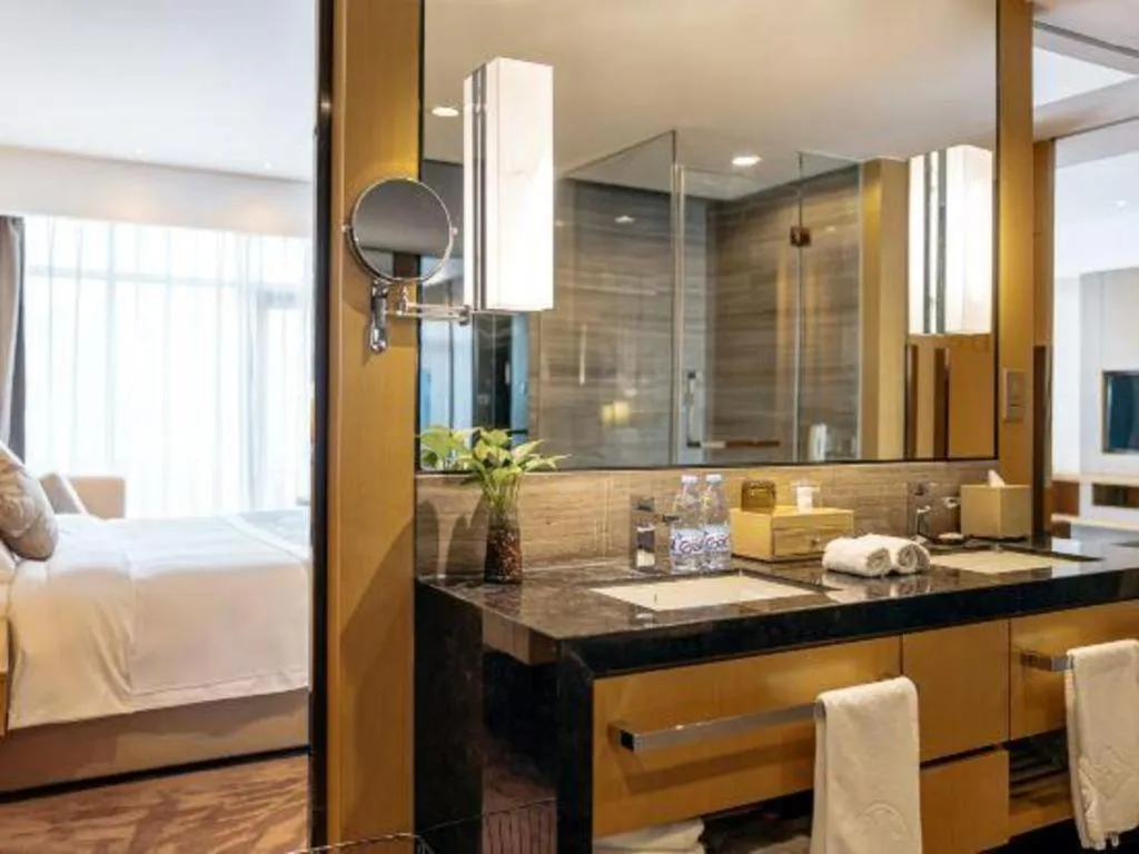 Bed in CITIC Jinling Hotel