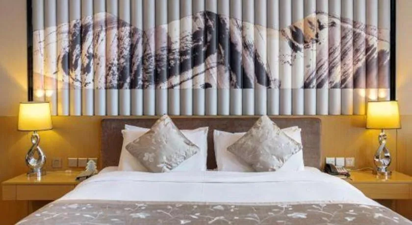 Bed in CITIC Jinling Hotel