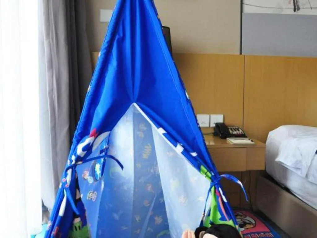 Bed in CITIC Jinling Hotel