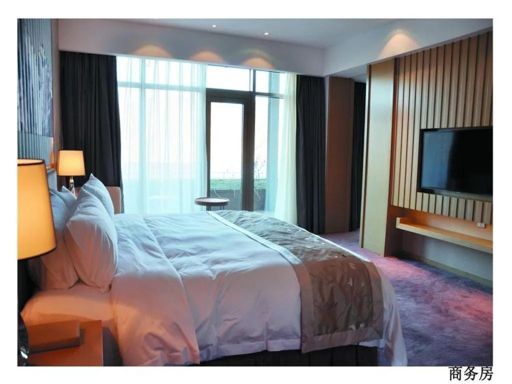Bed in CITIC Jinling Hotel