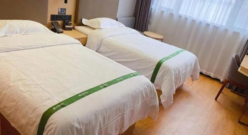 Bed in GreenTree Inn XuZhou PiZhou Dayunhe Decorative city PiXin(N) Road Express Hotel