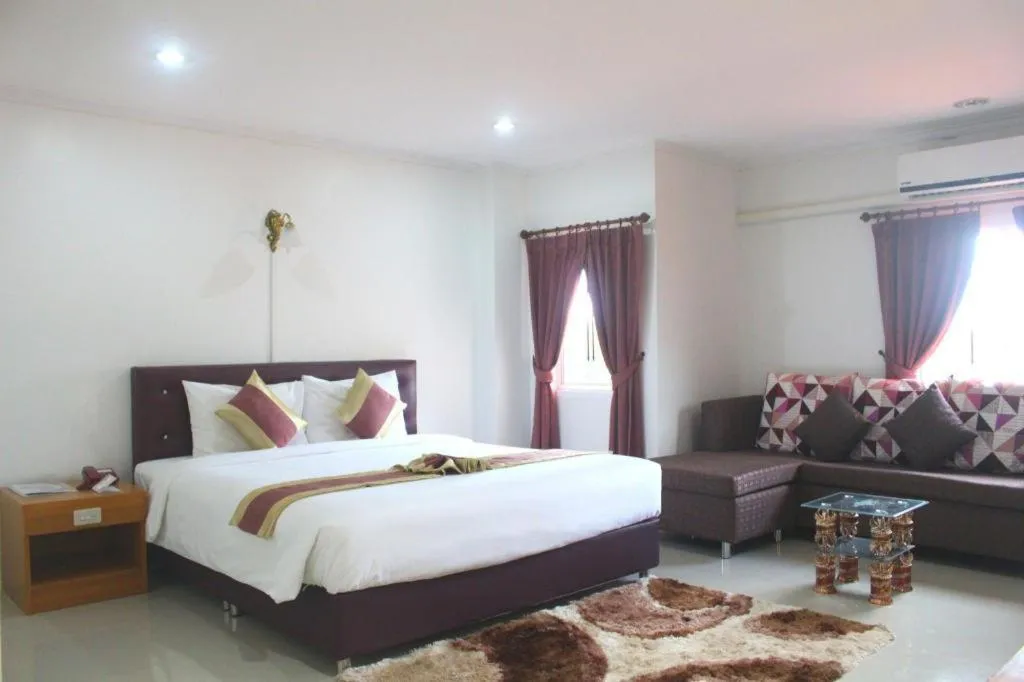 Bed in VC Phayao Hotel