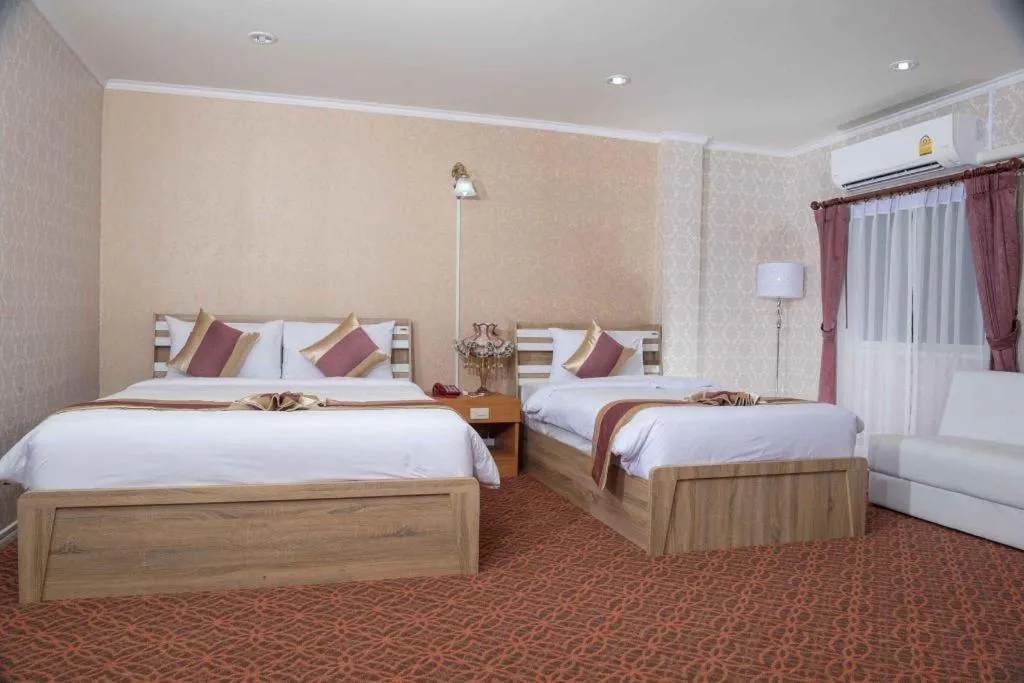 Bed in VC Phayao Hotel